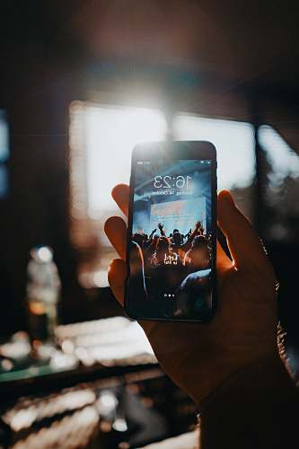 cell phone person holding space gray iPhone 6 electronics